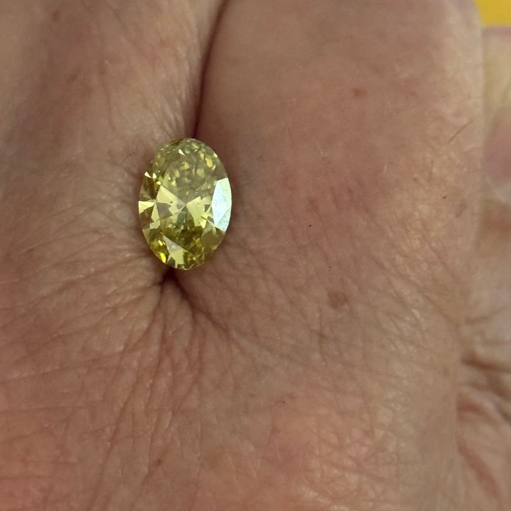 Yellow Radiant Ring with Fancy Intense Diamond